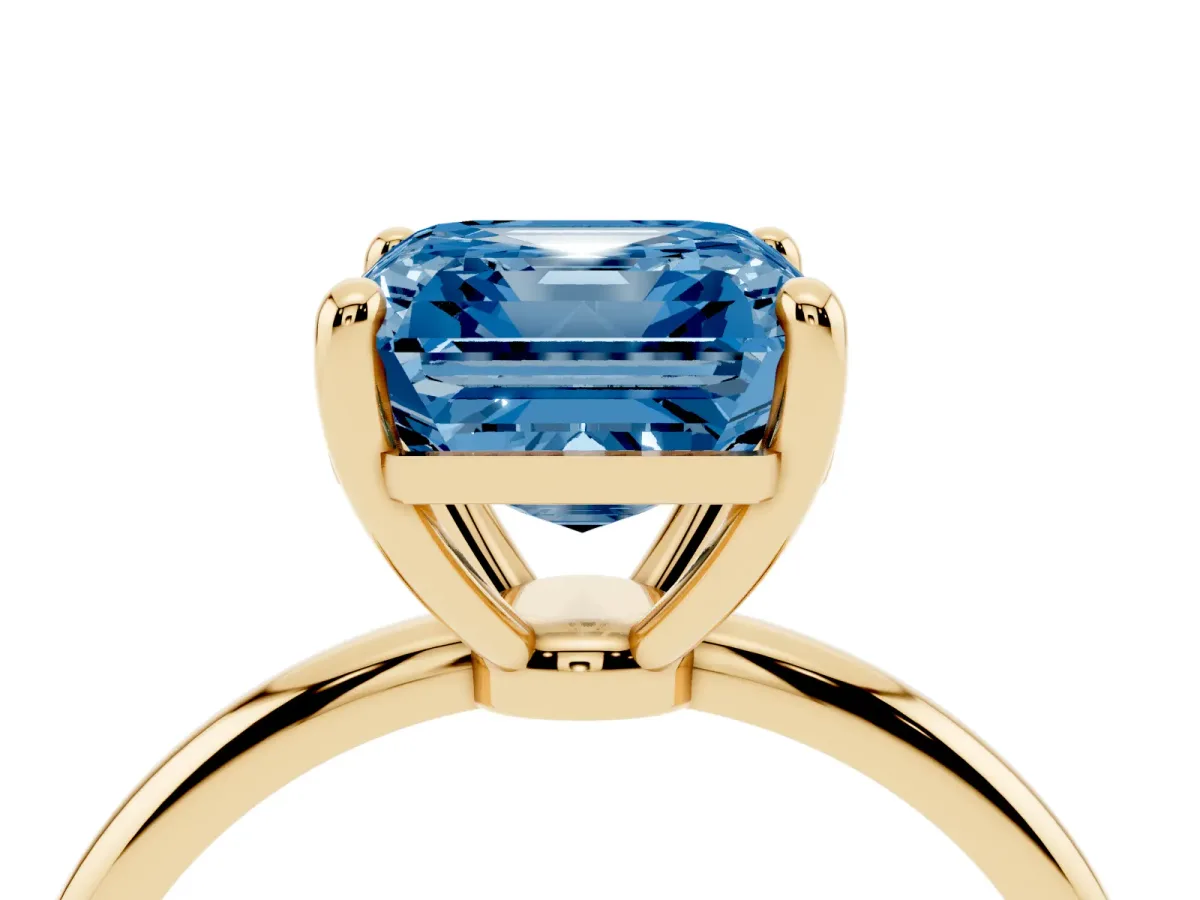Fancy Blue Asscher Cut Solitaire Diamond Ring with 4-Prong Setting on a Classic Band Yellow gold