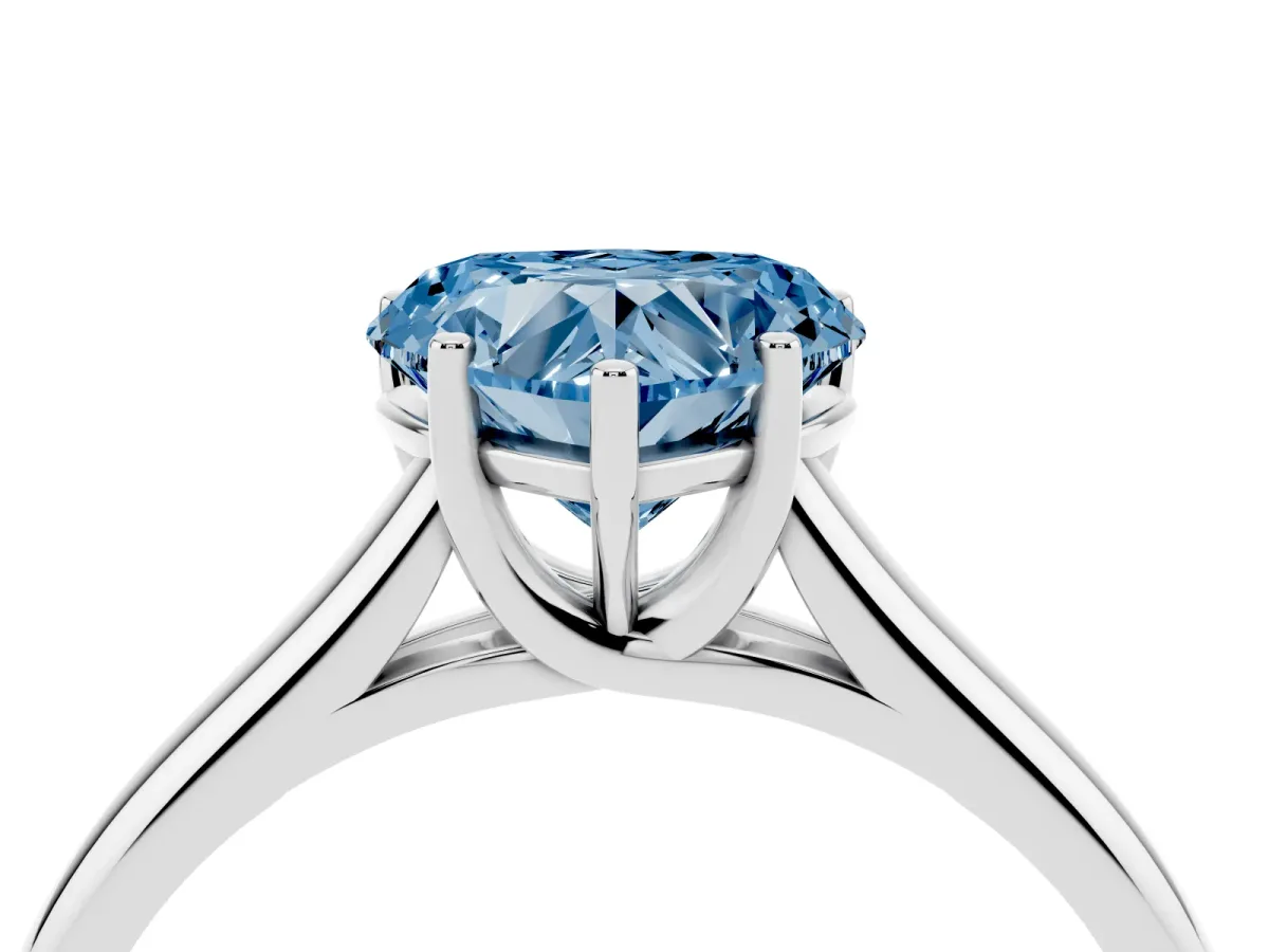 Fancy Blue Heart Cut Cut Diamond Solitaire Engagement Ring with Tapered Plain Band and Four-Prong Setting Platinum