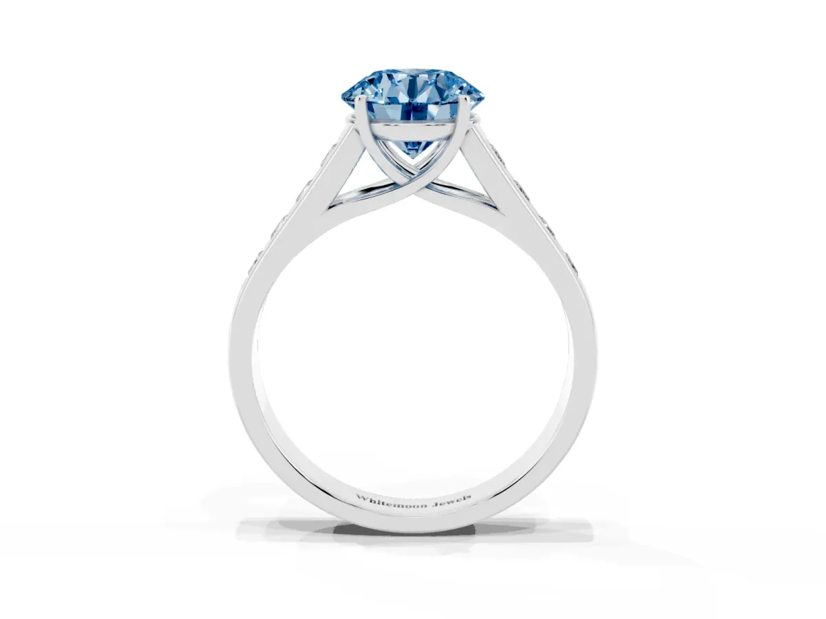 Fancy Blue Round Cut Brilliant Channel-Set Solitaire Ring with Four-Prong Setting Platinum