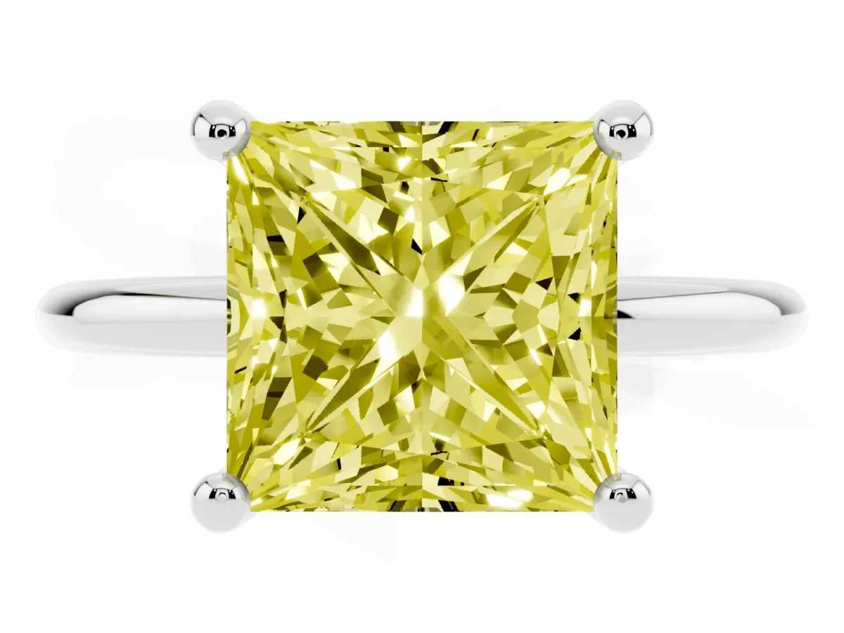 Fancy Yellow Princess Cut Solitaire Diamond Ring with 4-Prong Setting on a Classic Band Silver