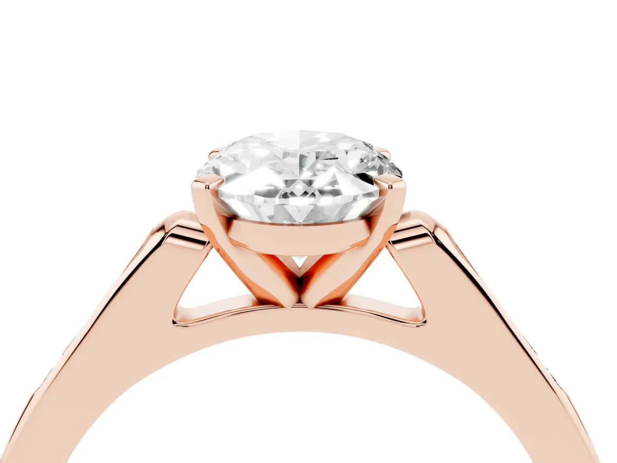Oval Cut Diamond Solitaire Ring with Channel Set Round Band and Prong Setting Rose gold