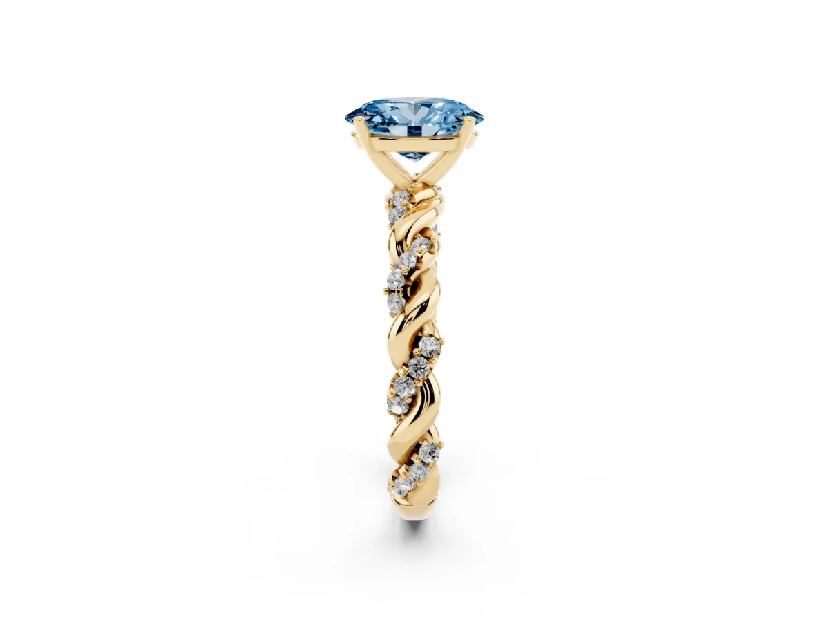 Fancy Blue Oval Cut Diamond Solitaire Ring with Twisted Band and Pavé Accents Yellow gold
