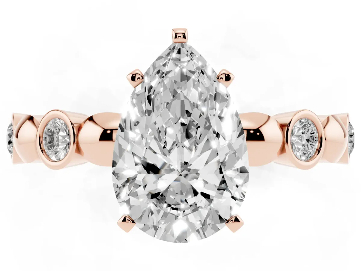 Pear Cut Solitaire Bezel-Set Diamond Ring with Beaded Band and Four-Prong Setting Rose gold