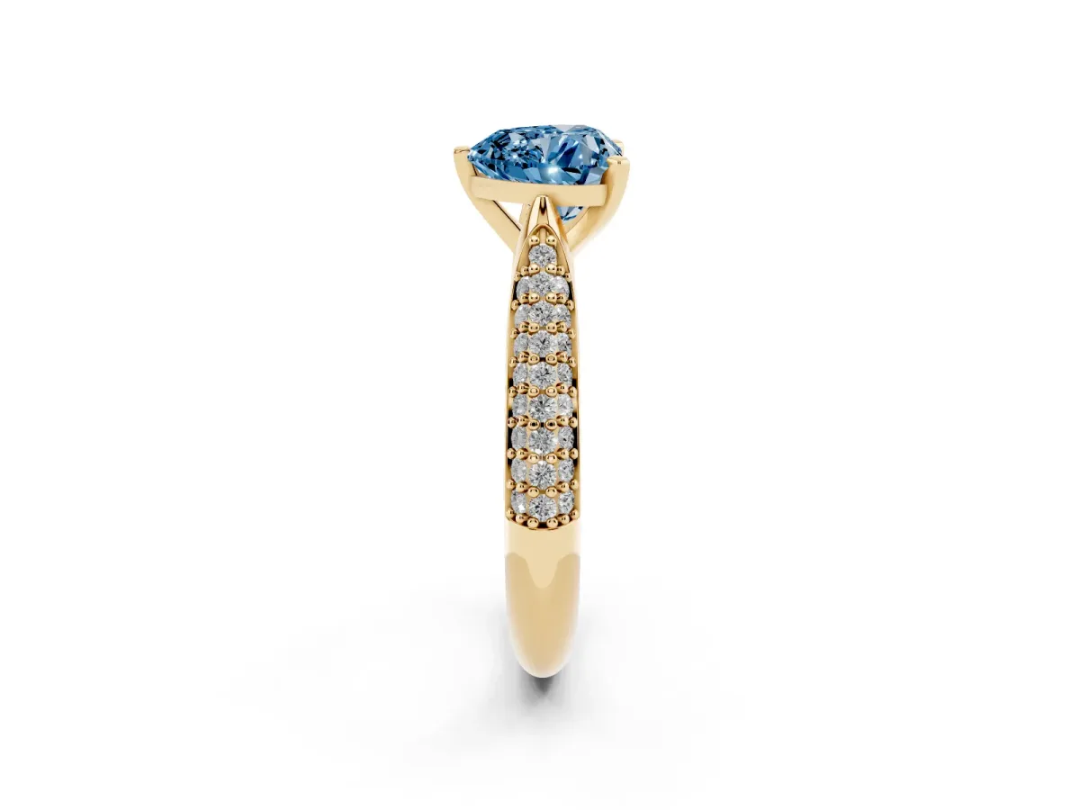 Fancy Blue Heart Cut Diamond Solitaire Engagement Ring with Multi-Row Round Pavé Band and Prong Setting Yellow gold