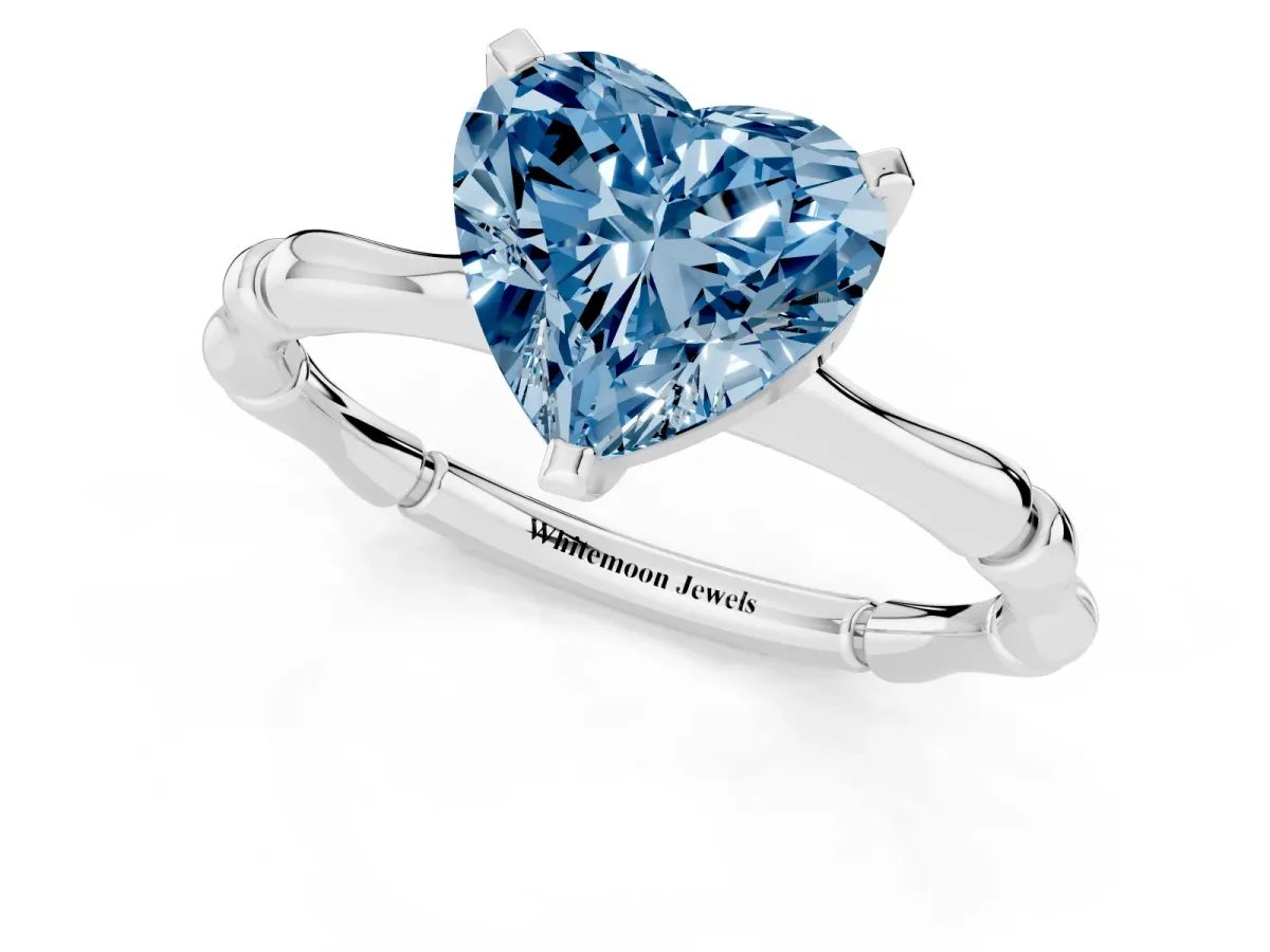 Fancy Blue Heart Cut Solitaire Diamond Ring with Bamboo Band and Four-Prong Setting Silver