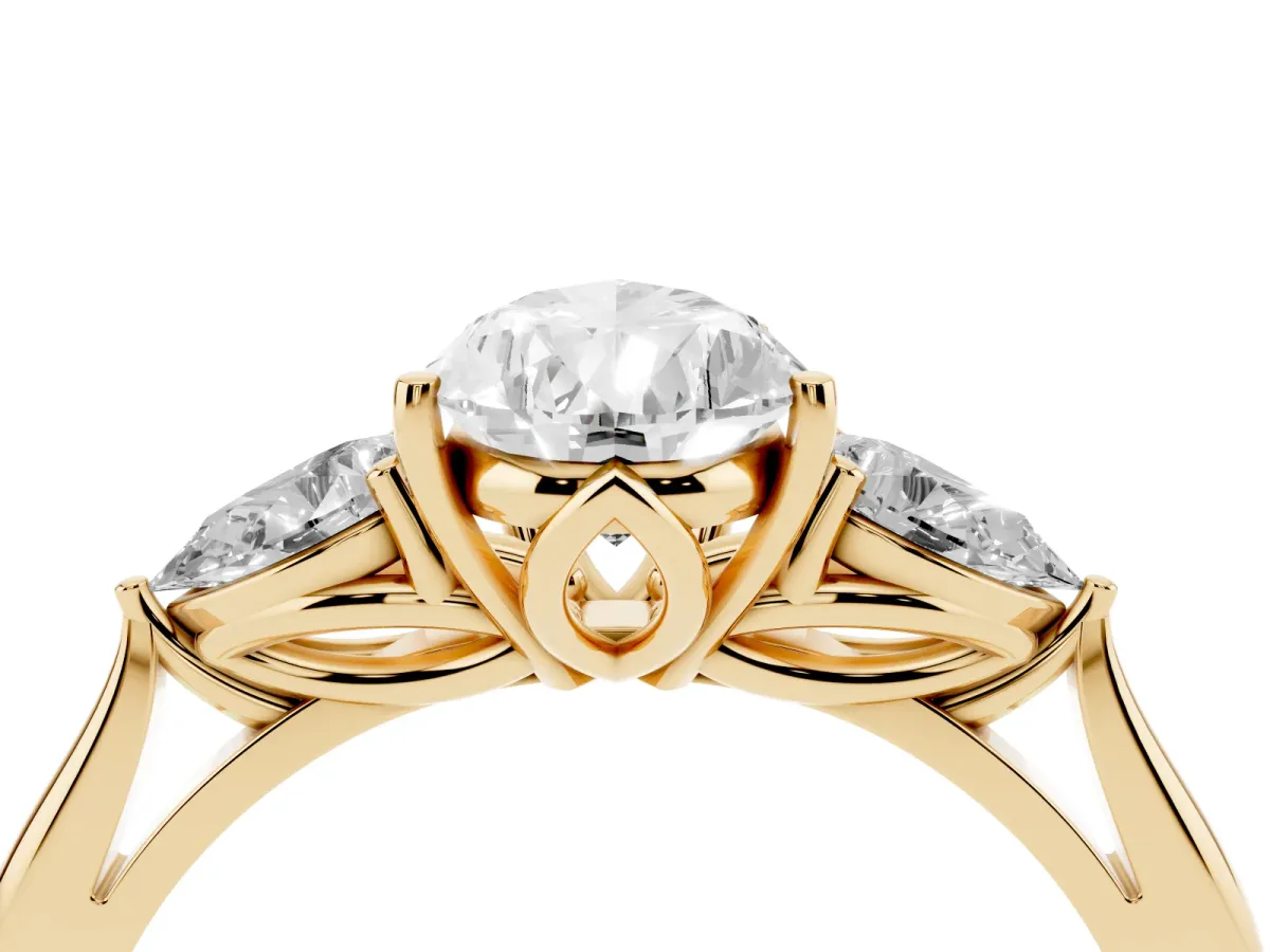 Pear Cut Diamond Three-Stone Ring with Pear Side Stones and Prong Setting Yellow gold