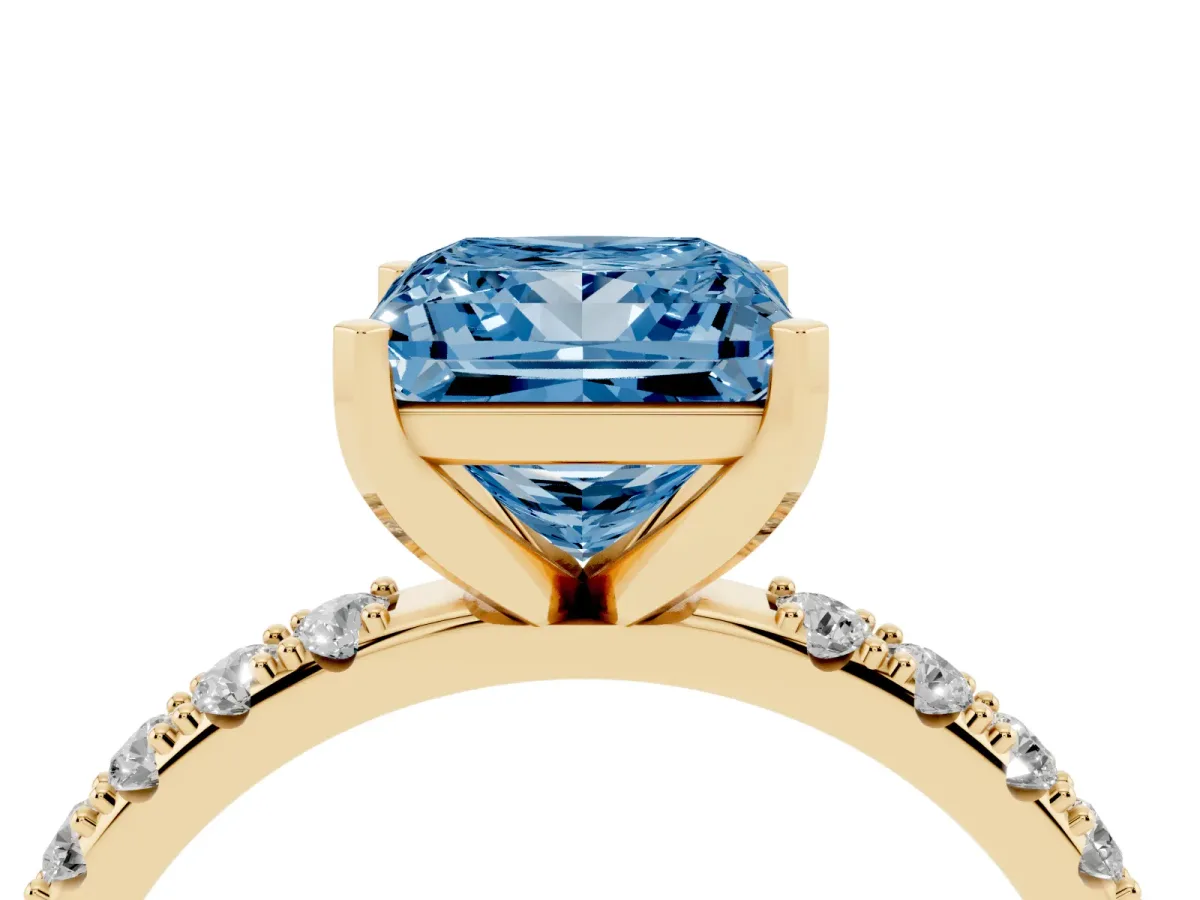 Fancy Blue Princess Cut Diamond Solitaire Pavé Band with Four-Prong Setting Yellow gold