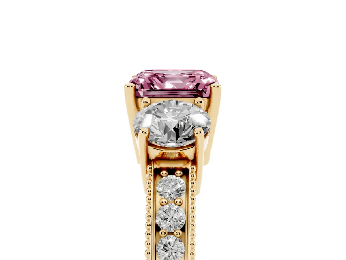 Fancy Pink Asscher Cut Three-Stone Diamond Ring with Pavé Band and Four-Prong Setting Yellow gold