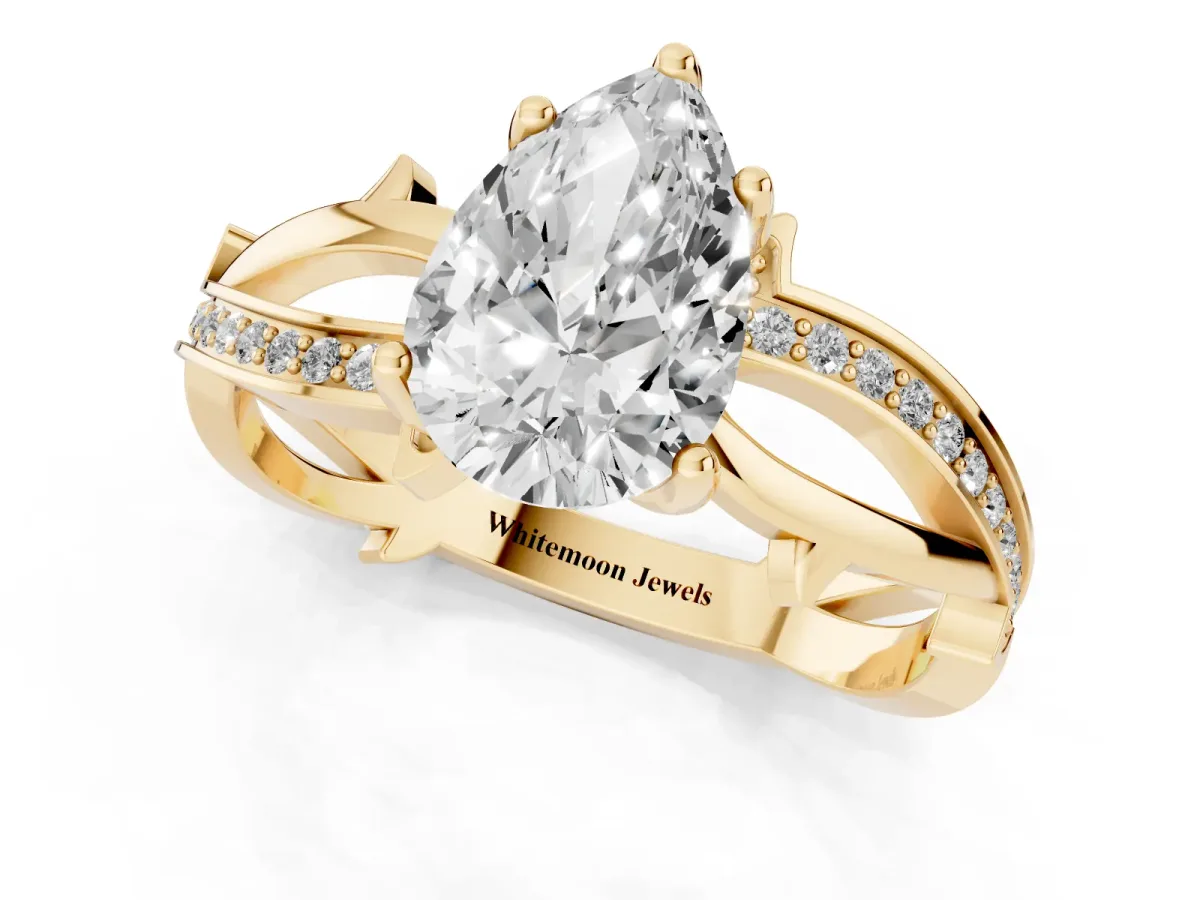 Pear Cut Solitaire Twist Band with Pavé Accents and Four-Prong Setting Yellow gold