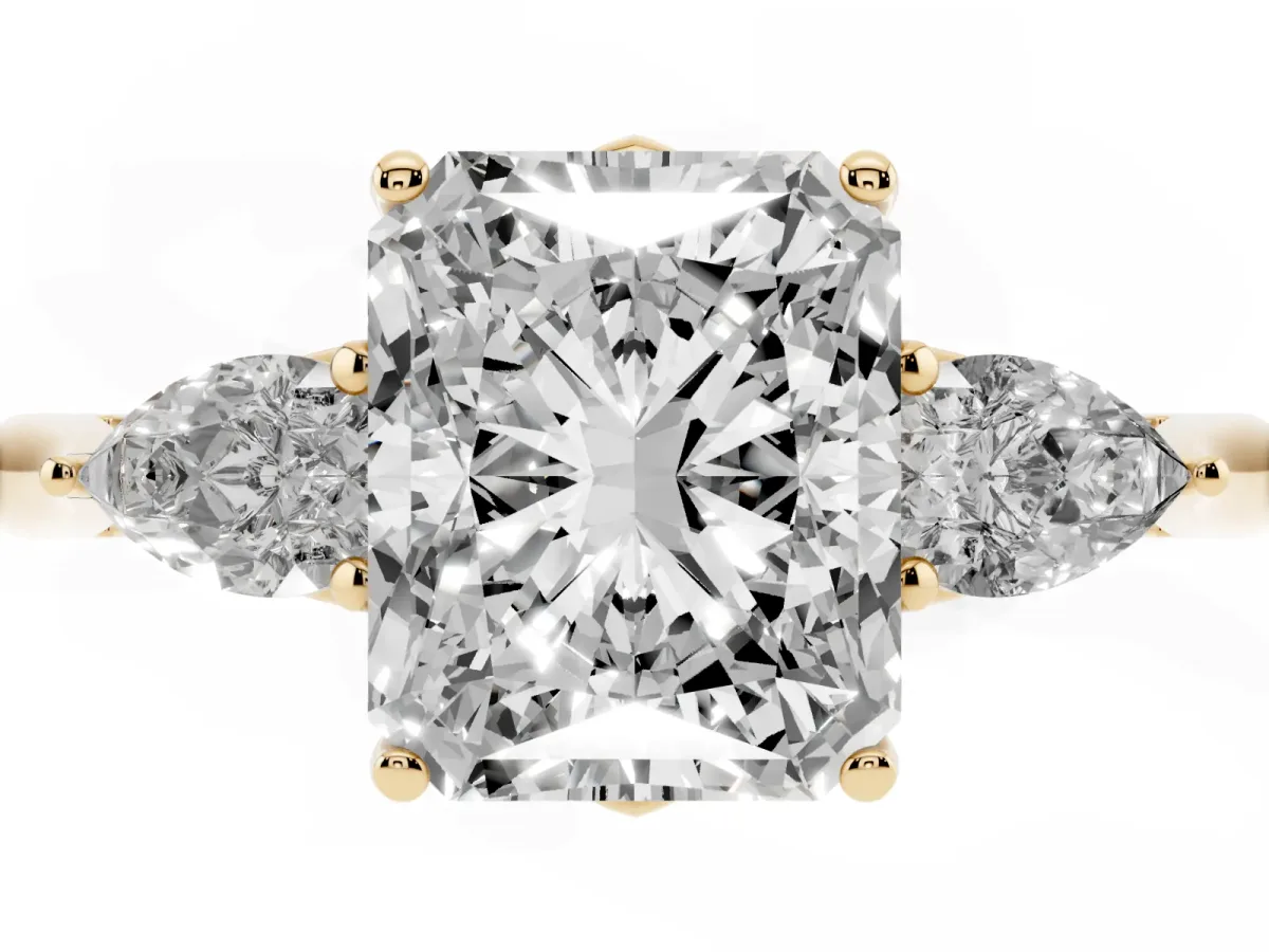 Three-Stone Radiant Cut Brilliant Diamond Solitaire Ring with Tapered Band and Four-Prong Setting Yellow gold