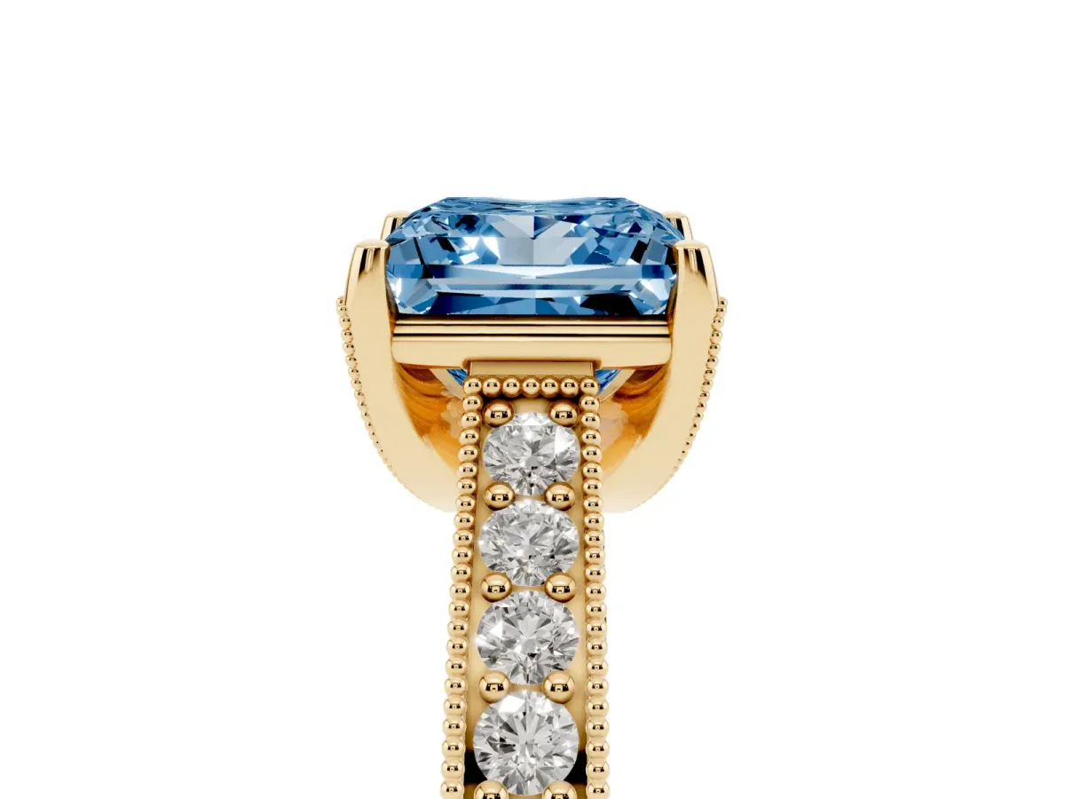 Fancy Blue Princess Cut Cut Diamond Solitaire Ring with Milgrain Pave Band and Four Prong Setting Yellow gold