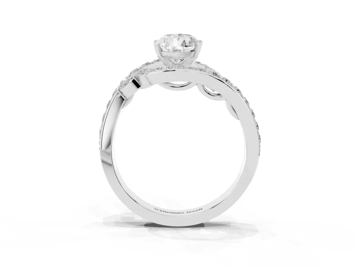 Pear Cut Solitaire with Pavé Twist Band and Four-Prong Setting Silver