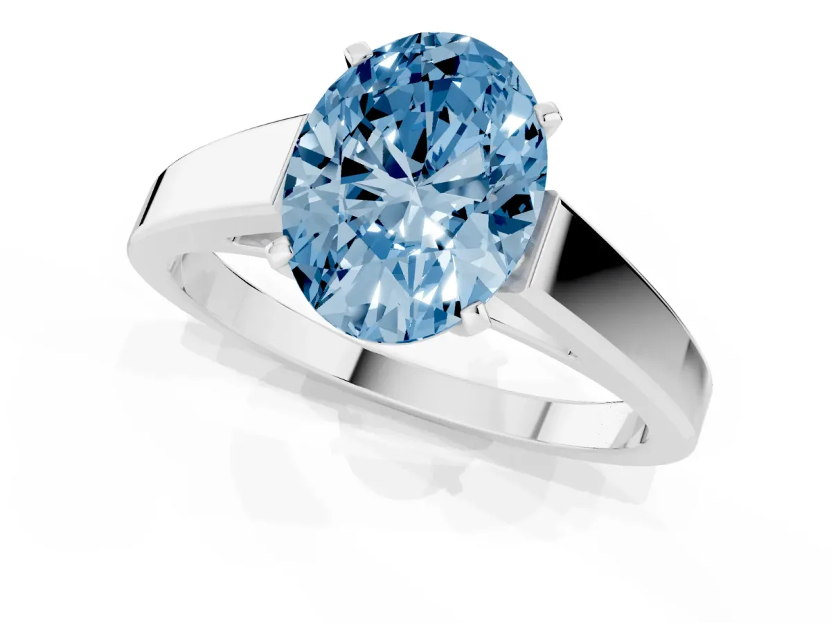 Fancy Blue Oval Cut Solitaire Engagement Ring with Four-Prong Setting and Tapered Band Silver