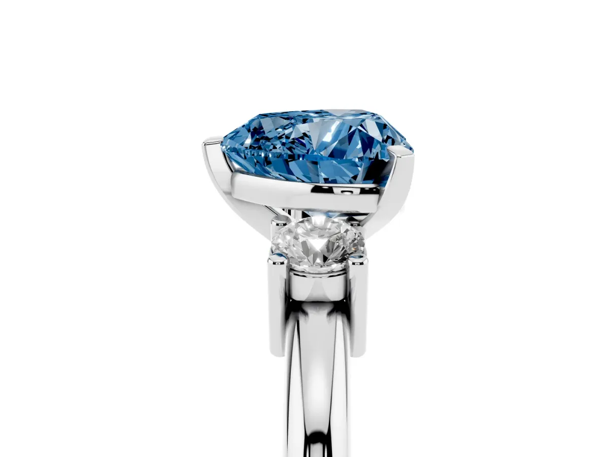 Fancy Blue Three-Stone Heart Cut Cut Diamond Solitaire with Prong Setting and Classic Band Silver