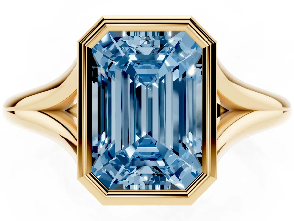 Fancy Blue Bezel Set Emerald Cut Cut Solitaire Ring with Tapered Band Yellow gold
