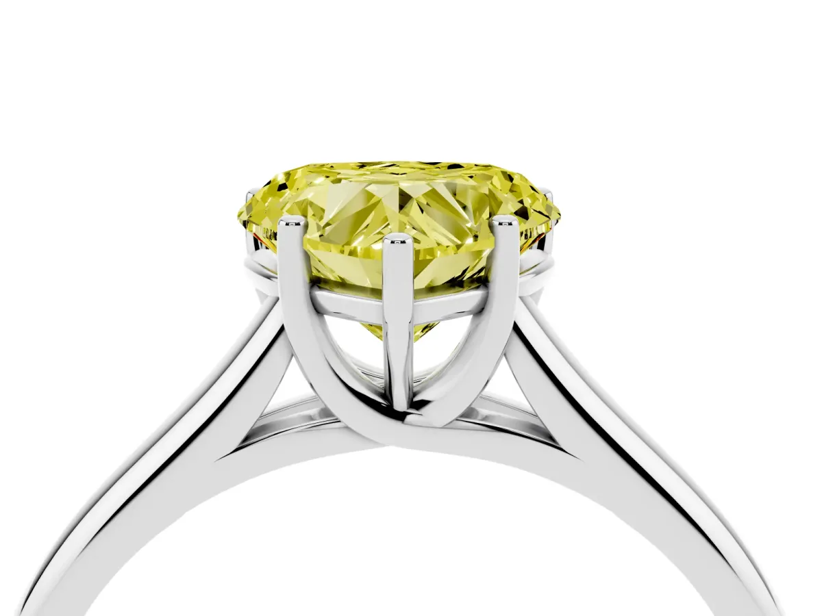 Fancy Yellow Heart Cut Cut Diamond Solitaire Engagement Ring with Tapered Plain Band and Four-Prong Setting Platinum