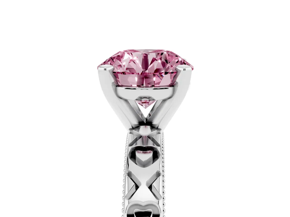Fancy Pink Round Cut Solitaire Diamond Engagement Ring with XO Engraved Band and Four-Prong Setting Silver