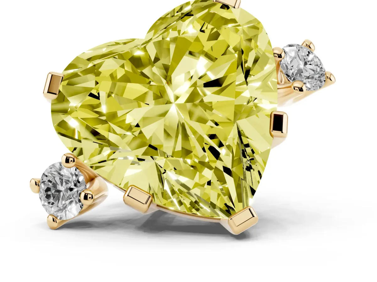 Fancy Yellow Heart Cut Cut Three-Stone Solitaire Ring with Round Accent Diamonds and Four-Prong Setting Yellow gold
