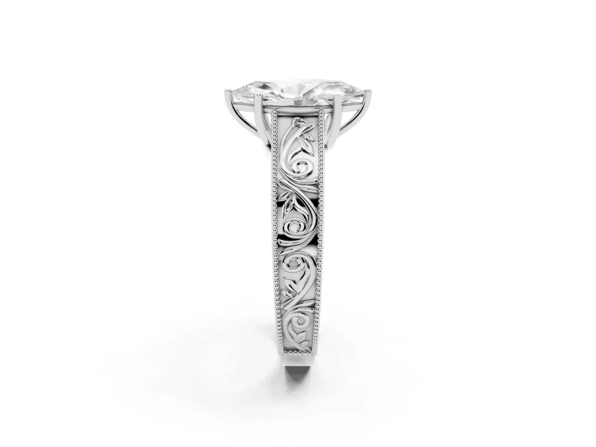 Marquise Cut Diamond Solitaire Ring with Engraved Band and Four-Prong Setting Silver