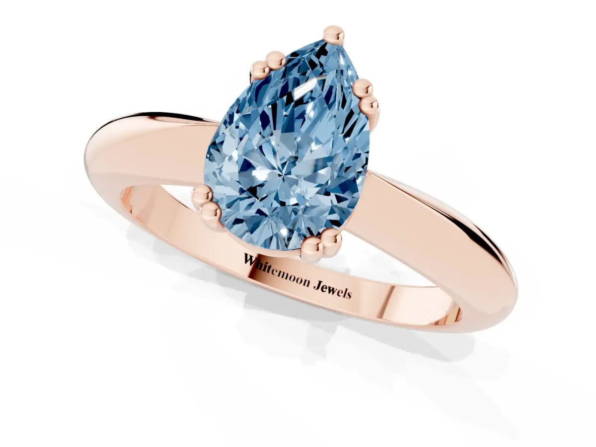 Fancy Blue Pear Cut Cut Solitaire Engagement Ring with Tapered Band and Four-Prong Setting Rose gold