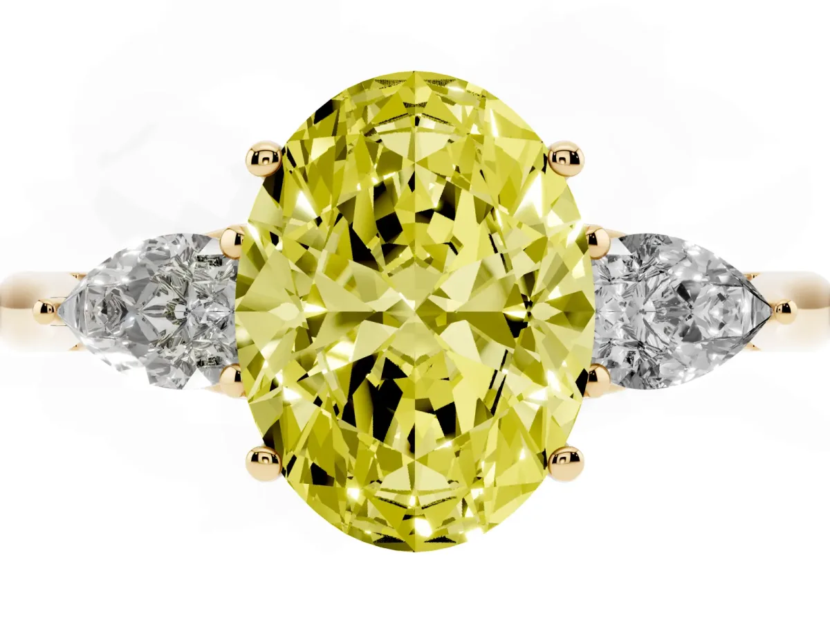 Fancy Yellow Three-Stone Oval Cut Diamond Ring with Pear Side Stones in Four-Prong Setting Yellow gold