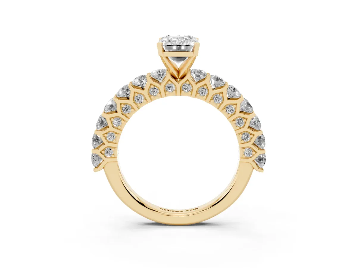 Emerald Cut Diamond Solitaire Ring with Shared Prong Pavé Band and Four-Prong Setting Yellow gold