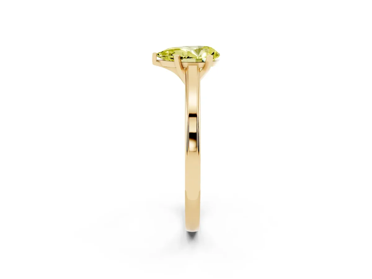 Fancy Yellow Pear Cut Solitaire Diamond Ring with Four-Prong Setting and Classic Band Yellow gold