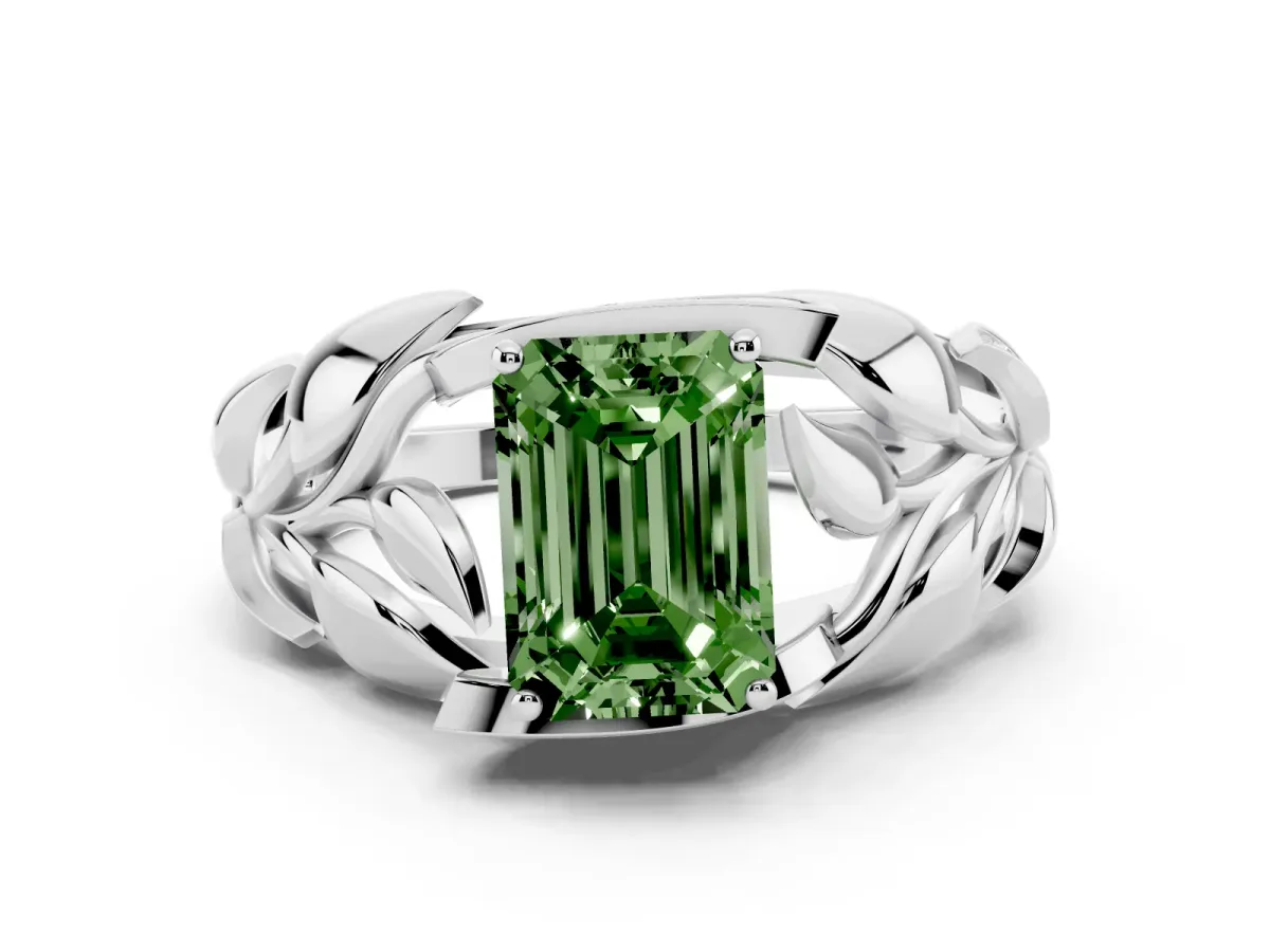 Fancy Green Emerald Cut Diamond Leaf-Inspired Engagement Ring with Round Accents and Prong Setting Silver