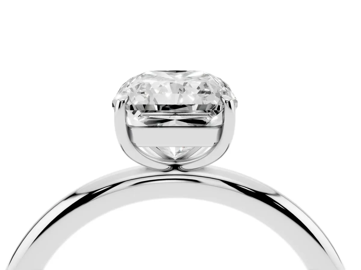 Radiant Cut Solitaire Diamond Ring with Four-Prong Setting on a Plain Band Platinum