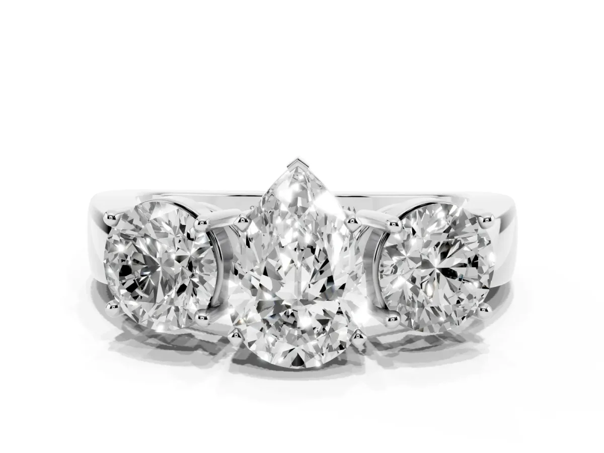 Three-Stone Pear Cut Diamond Ring with Round Side Stones, Classic Band, and Four-Prong Setting Platinum