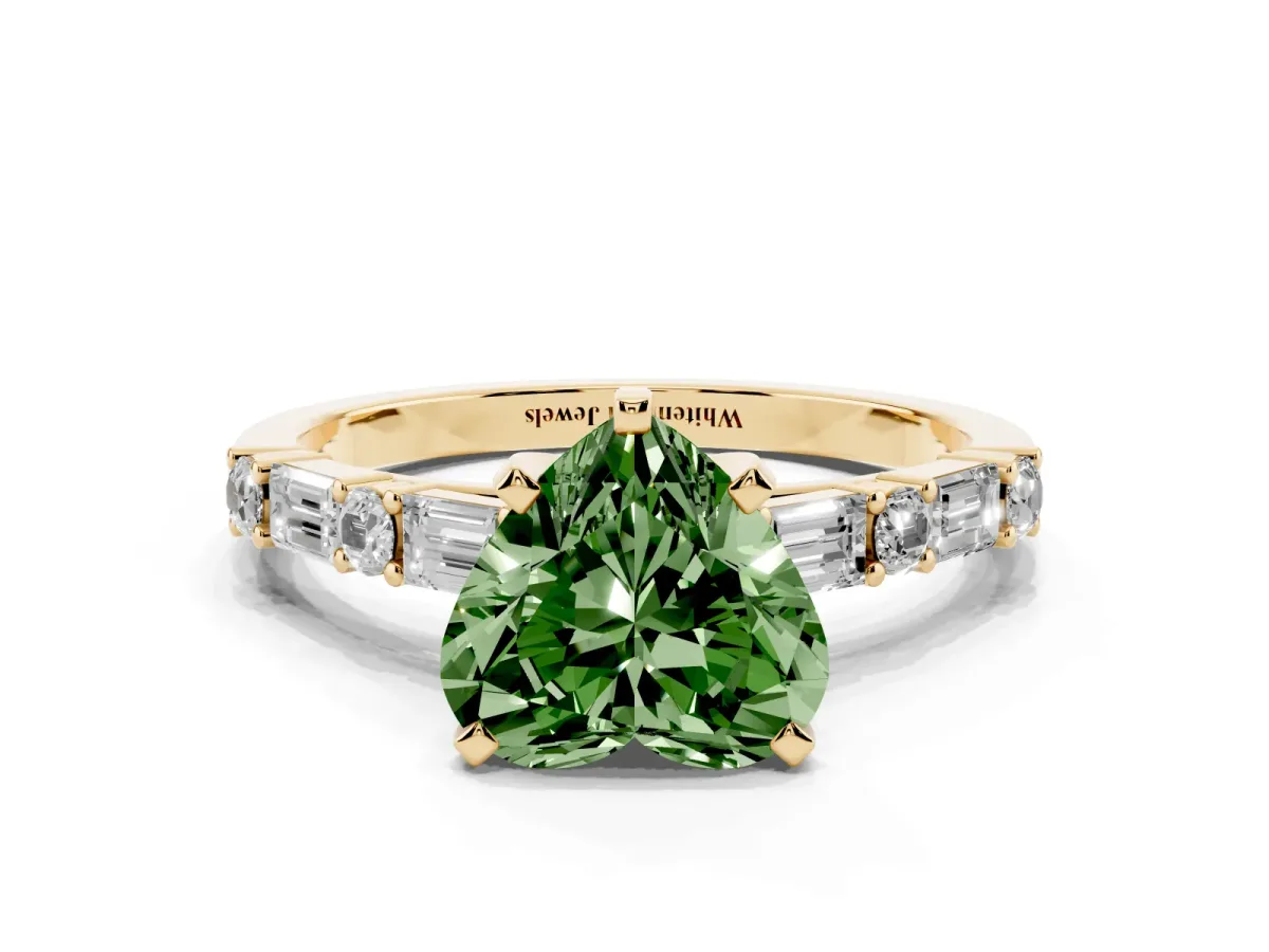 Fancy Green Heart Cut Diamond Solitaire with Side Baguettes and Channel Set Band Yellow gold