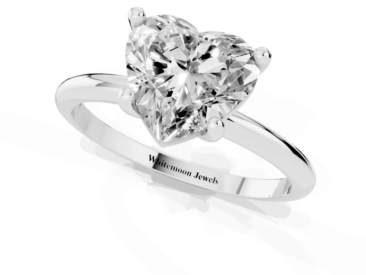 Heart Cut Solitaire Diamond Ring with 4-Prong Setting on a Classic Band Silver
