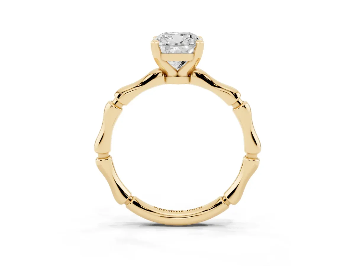 Cushion Cut Solitaire Diamond Ring with Bamboo Band and Four-Prong Setting Yellow gold