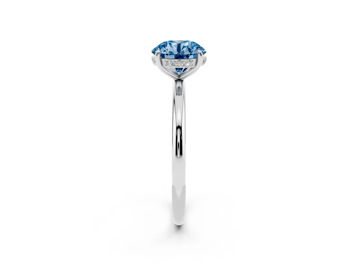 Fancy Blue Round Cut Solitaire Diamond Ring with a Classic Band and Four-Prong Setting Silver