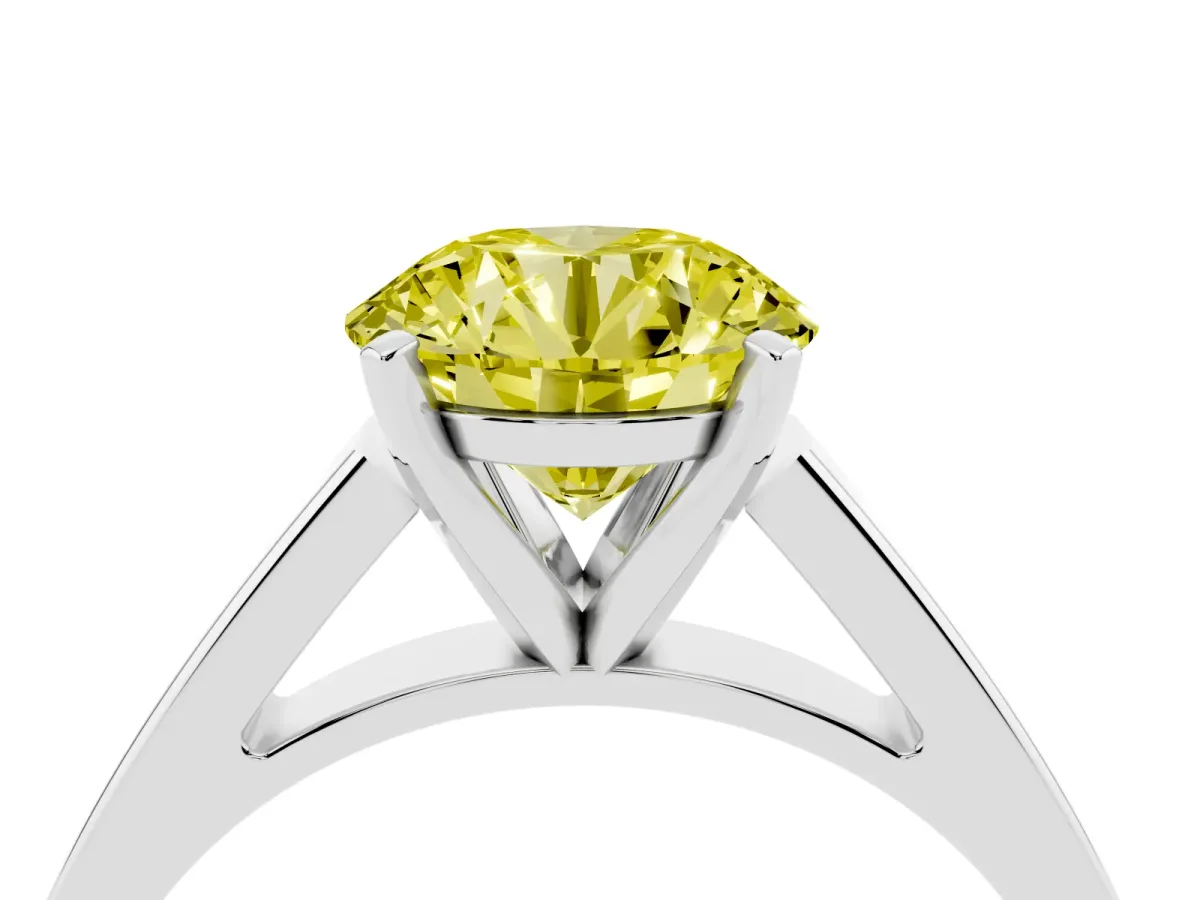 Fancy Yellow Round Cut Solitaire Engagement Ring with Four-Prong Setting and Tapered Band Silver