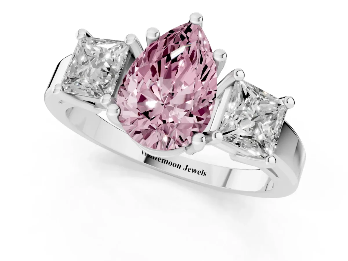 Fancy Pink Three-Stone Pear Cut Cut Solitaire Ring with Prong Setting Platinum