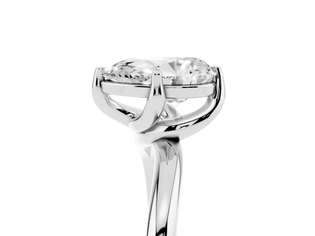 Pear Cut Diamond Solitaire Engagement Ring with Four-Prong Setting and Classic Band Silver
