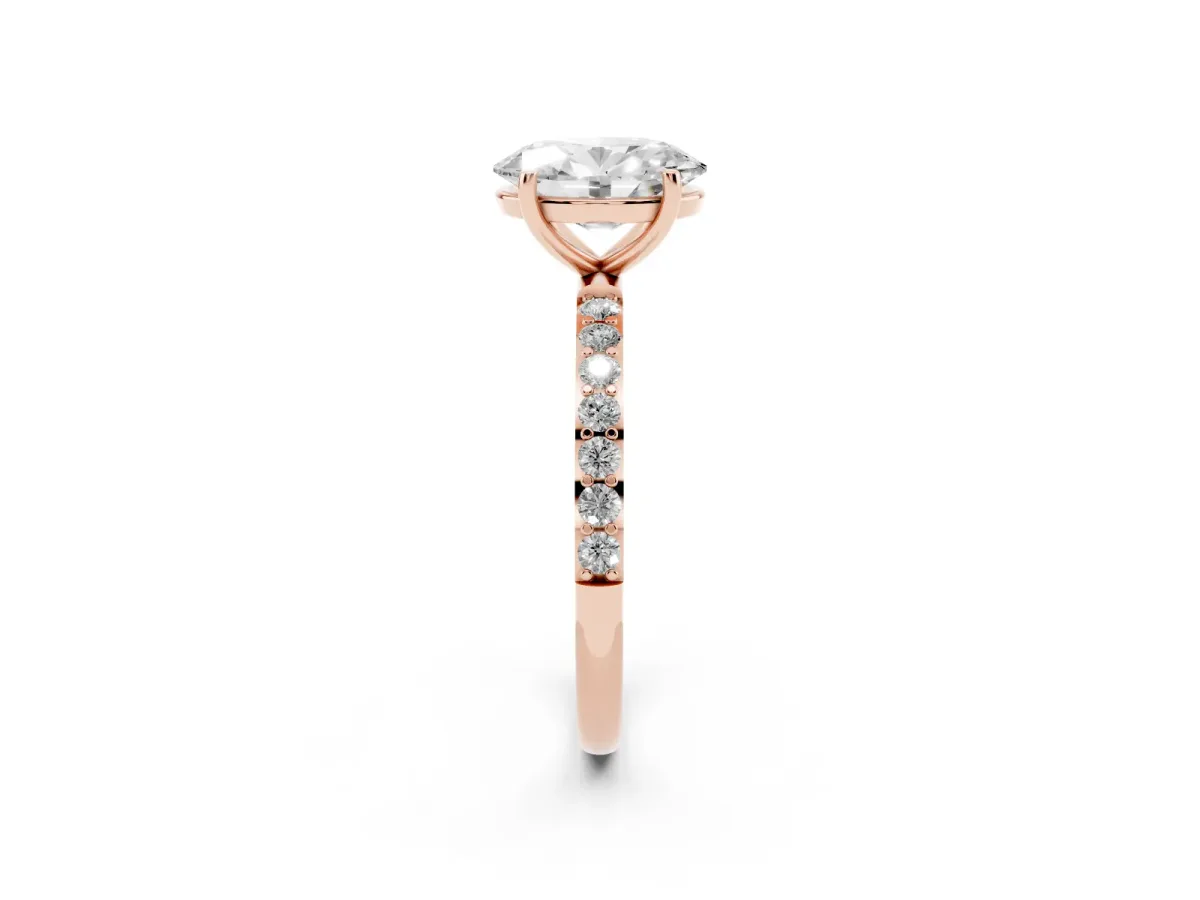 Oval Cut Diamond Solitaire Ring with Round Pavé Shoulders and Prong Setting Rose gold