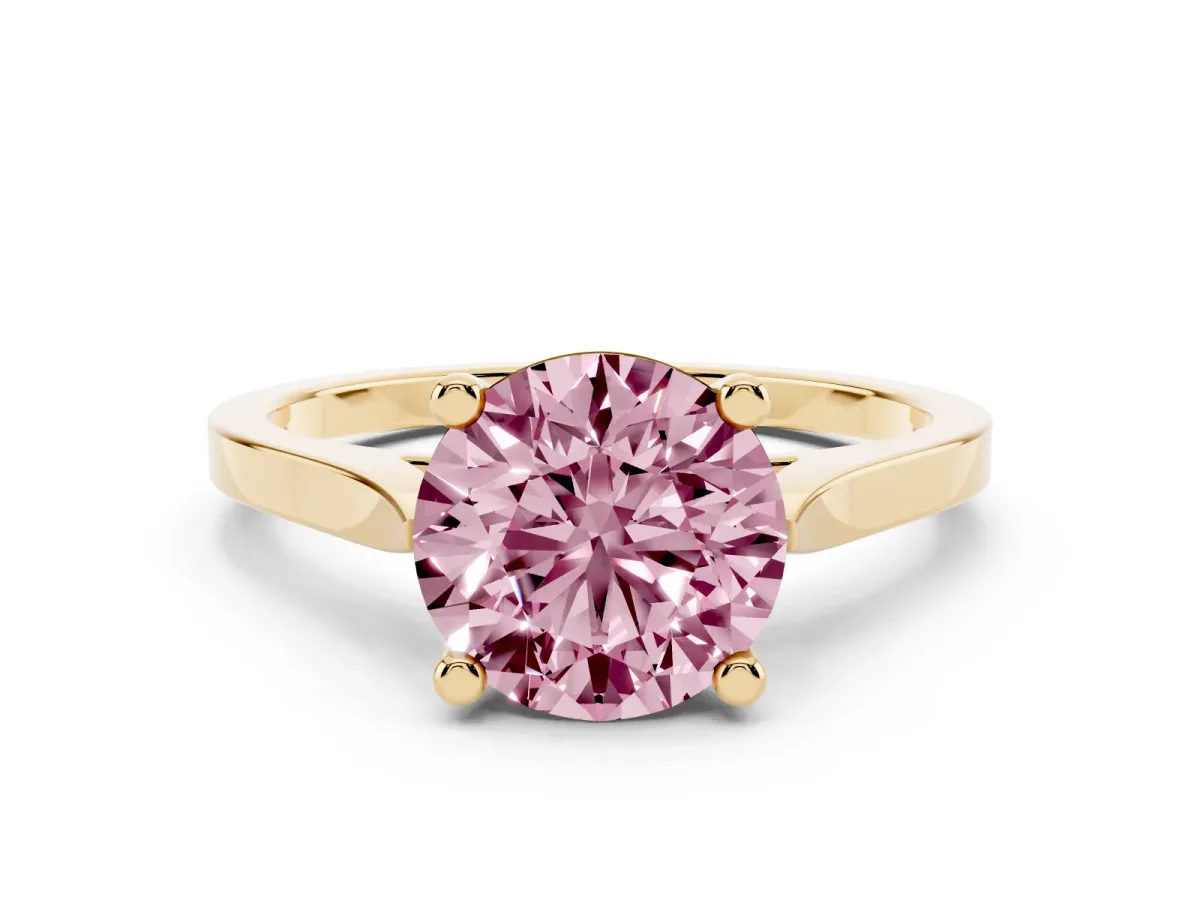 Fancy Pink Round Cut Solitaire Diamond Ring with Four-Prong Setting and Tapered Band Yellow gold