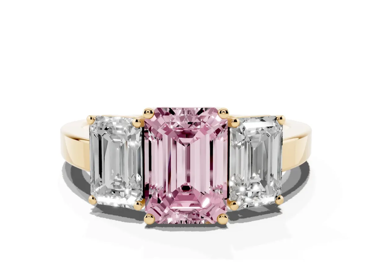 Fancy Pink Three-Stone Emerald Cut Cut Diamond Engagement Ring with Flat Band and Four-Prong Setting Yellow gold
