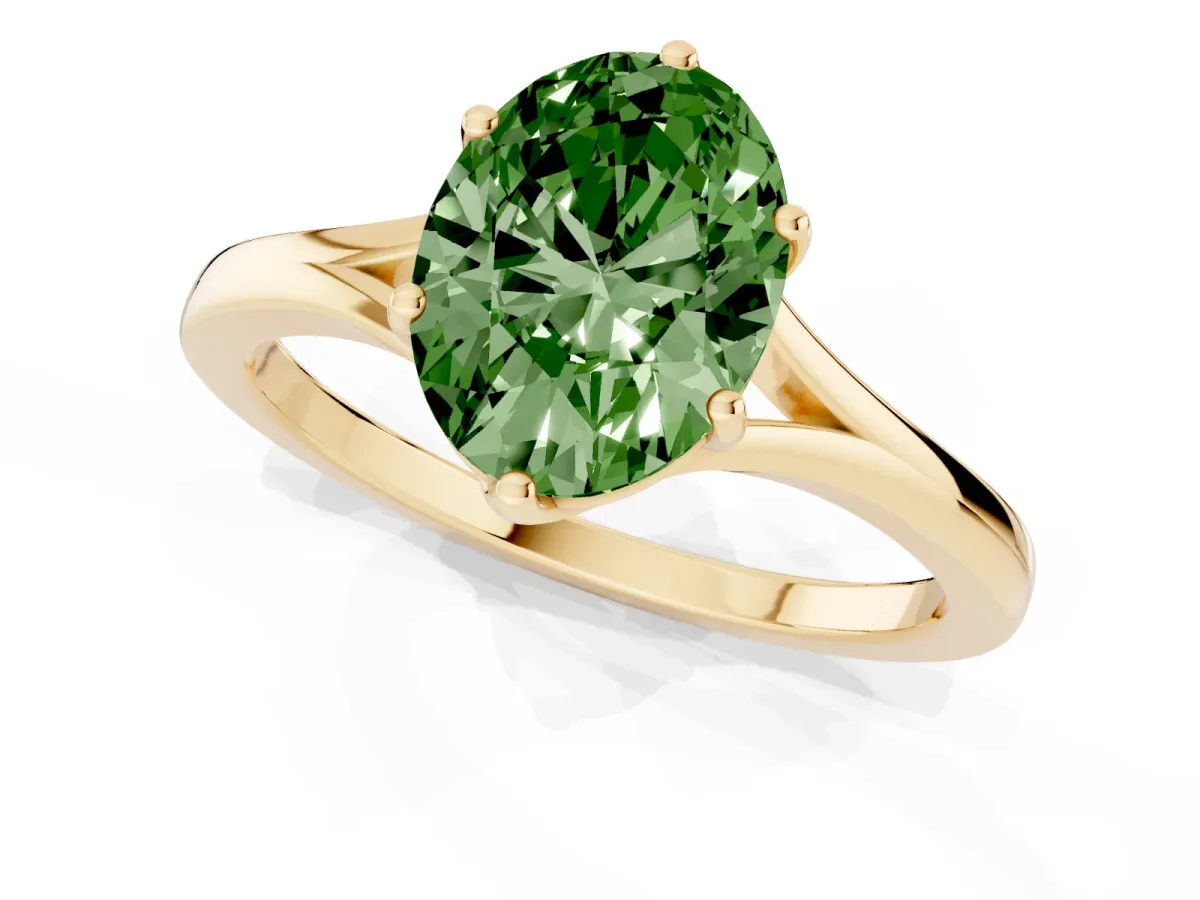 Fancy Green Oval Cut Solitaire Diamond Ring with Six-Prong Setting and Tapered Band Yellow gold