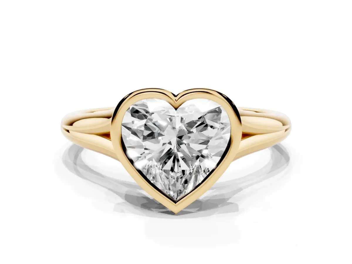 Bezel Set Heart Cut Cut Solitaire Ring with Tapered Band Yellow gold