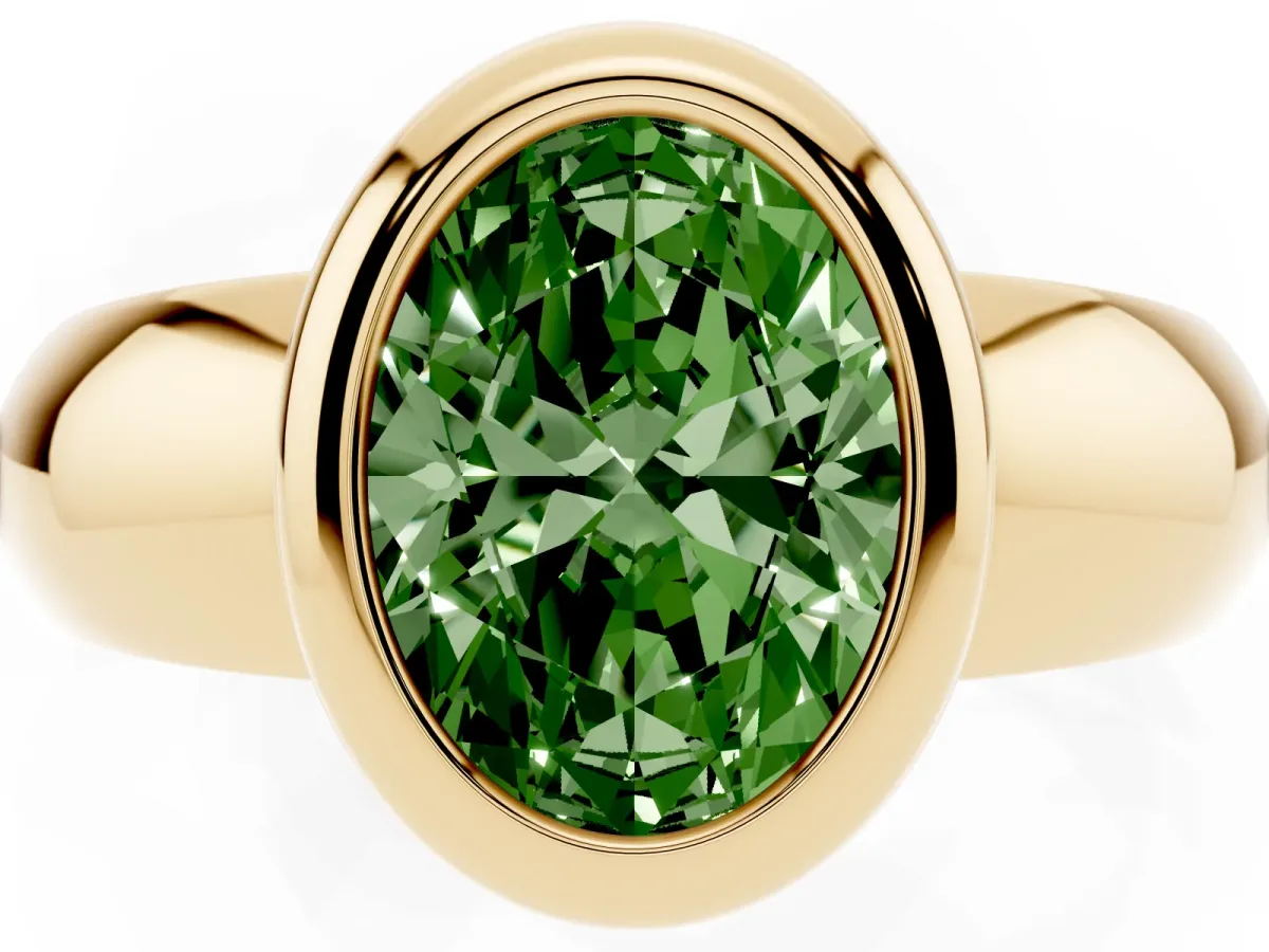 Fancy Green Bezel Set Oval Cut Solitaire Ring with Wide Band Yellow gold