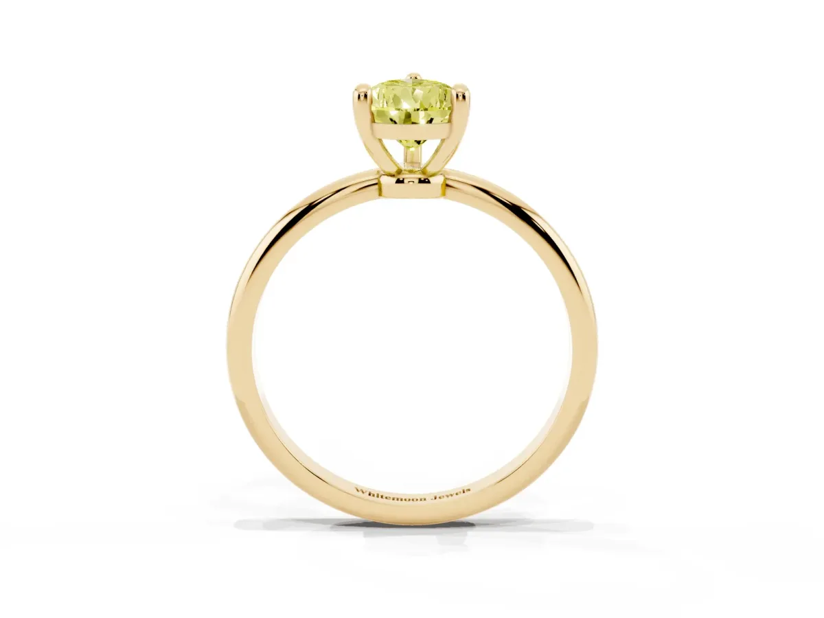 Fancy Yellow Pear Cut Solitaire Diamond Ring with 4-Prong Setting on a Classic Band Yellow gold