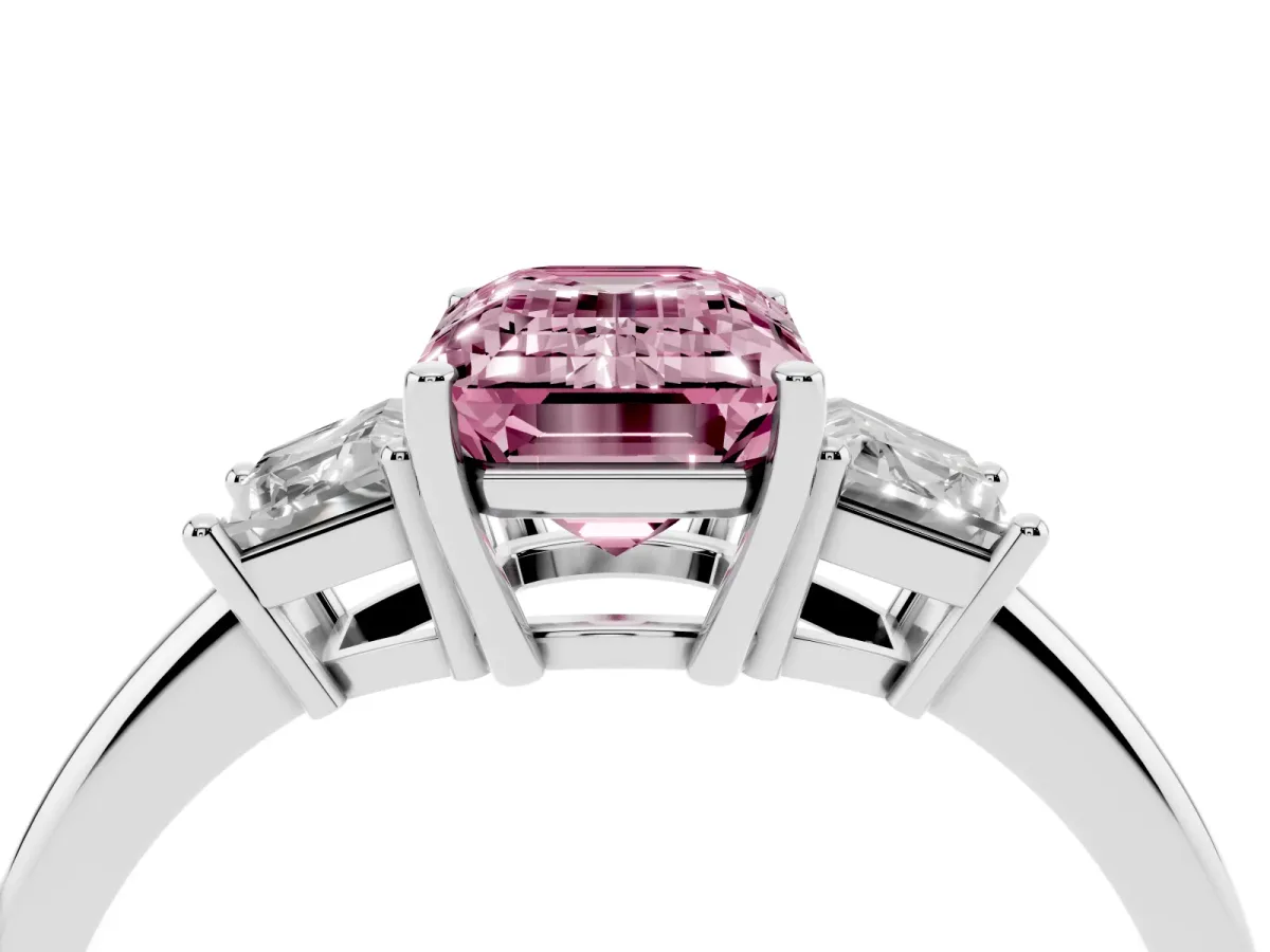 Fancy Pink Emerald Cut Diamond Three-Stone Ring with Trapezoid Side Stones and Prong Setting Platinum