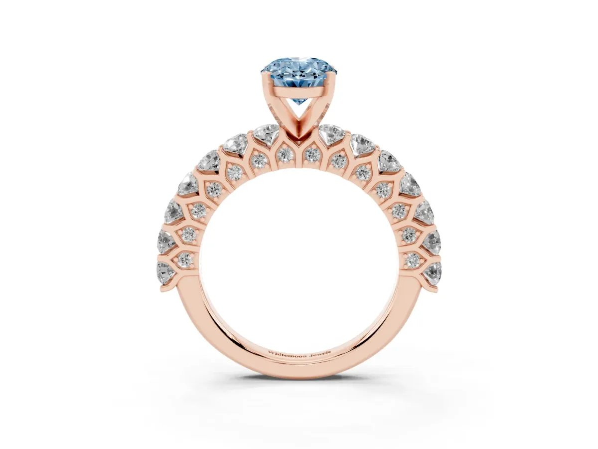 Fancy Blue Oval Cut Diamond Solitaire Ring with Shared Prong Pavé Band and Four-Prong Setting Rose gold