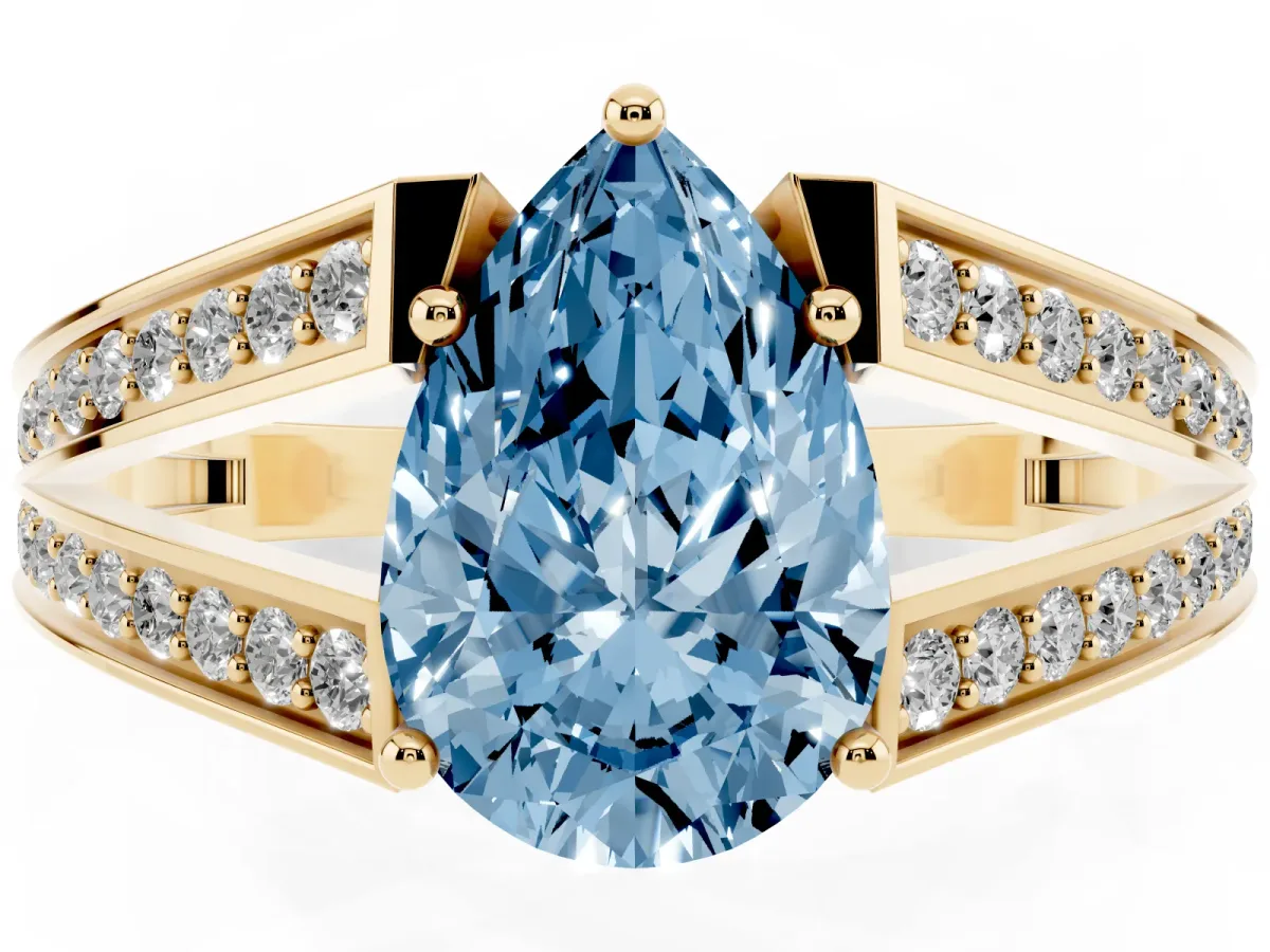 Fancy Blue Pear Cut Diamond Split Shank Ring with Pavé Band and Four-Prong Setting Yellow gold