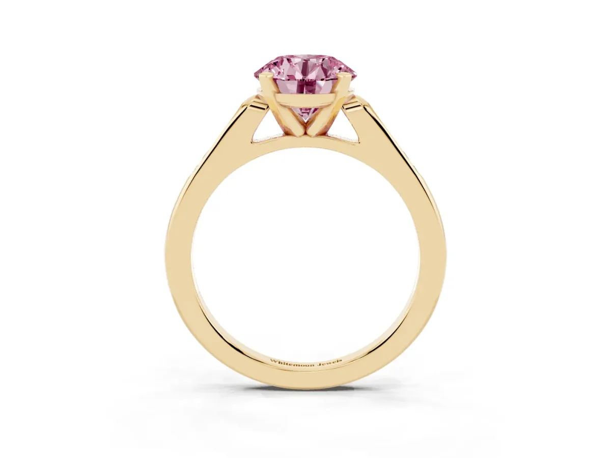 Fancy Pink Round Cut Diamond Solitaire Ring with Channel Set Round Band and Prong Setting Yellow gold