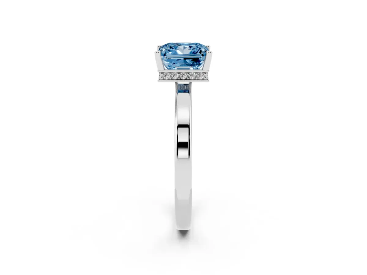 Fancy Blue Princess Cut Cut Solitaire Engagement Ring with Four-Prong Setting on a Classic Band Silver