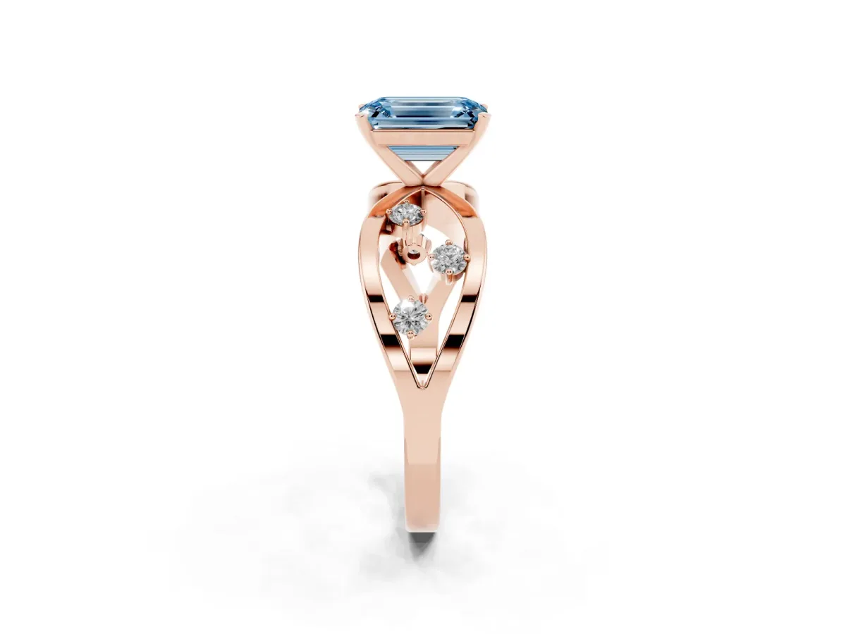 Fancy Blue Emerald Cut Cut Solitaire Diamond with Side Stones on Criss-Cross Band and Four-Prong Setting Rose gold